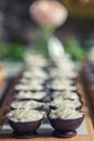 Chocolate sweet dessert filling with coconut cream and coconut petals on top, product photography fot patisserie Royalty Free Stock Photo