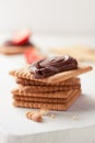 Chocolate sweet melting nougat cream on cookies with strawberries Royalty Free Stock Photo