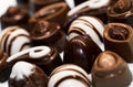 Chocolate sweets of various shapes, delicious appetizing,