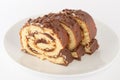 Chocolate swiss roll on a plate Royalty Free Stock Photo