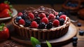 Chocolate tart with berry cut on the upper layer