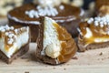 chocolate tartlet with cream filling and salted caramel with nuts