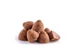 Chocolate truffles close-up horizontal view, white isolated background Royalty Free Stock Photo