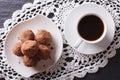 Chocolate truffles and coffee close-up on the table. Horizontal Royalty Free Stock Photo