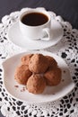 Chocolate truffles on a saucer close-up. Vertical Royalty Free Stock Photo