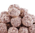 Chocolate truffles triangle closeup on white Royalty Free Stock Photo