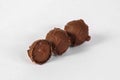 Chocolate truffles on white background Royalty Free Stock Photo