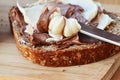 Chocolate and vanilla creamy spread on brown whole wheat bread slice