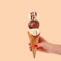 Chocolate and vanilla ice cream cone on faded pastel color background Royalty Free Stock Photo