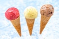 Chocolate, vanilla and strawberry Ice cream in the cone on white background Royalty Free Stock Photo