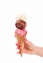 Chocolate, vanilla and strawberry ice cream cone on white background Royalty Free Stock Photo