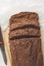 Chocolate vegan zucchini bread, white background.