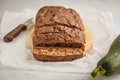 Chocolate vegan zucchini bread, white background.