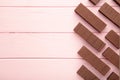 Chocolate wafers on pink background with copy space Royalty Free Stock Photo