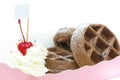Chocolate waffer with powder sugar and cherry Royalty Free Stock Photo