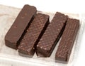 Chocolate waffle cookies with sweets on a white Royalty Free Stock Photo