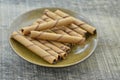 Chocolate waffle roll in brown plate Royalty Free Stock Photo