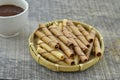 Chocolate waffle roll and vanilia waffle in bamboo basket Royalty Free Stock Photo