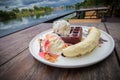 Chocolate waffles with vanilla ice cream, banana, whipped cream Royalty Free Stock Photo