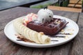 chocolate waffles with vanilla ice cream, banana, whipped cream Royalty Free Stock Photo