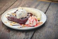 chocolate waffles with vanilla ice cream, banana, whipped cream Royalty Free Stock Photo