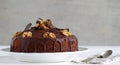 Chocolate walnut cake with chocolate glazing Royalty Free Stock Photo