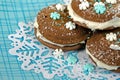 Chocolate whoopie pie with snowflakes