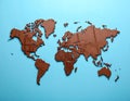 Chocolate World Map Brown on Blue. Royalty Free Stock Photo