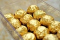 Chocolate wrapped in gold foils Royalty Free Stock Photo