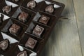 Chocolates in a box of correx on a rum background. Candy Storage Holiday Gift Royalty Free Stock Photo