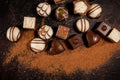 Chocolates white, dark, and milk chocolate, Chocolate Truffle black background Royalty Free Stock Photo