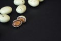 Chocolates wirh peanut in the form of quail eggs. Easter concept Royalty Free Stock Photo