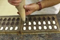 Chocolatier making praline