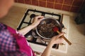 Chocolatier pastry chef melting chocolate in a water bath Royalty Free Stock Photo