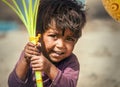 Choglamsar, Ladakh region, India - August 19, 2016: Little Indian boy sells the ballons on AUGUST 19, 2016 in Choglamsar, Leh Royalty Free Stock Photo