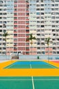 Choi Hung Estate rainbow apartment building and colorful basketball court in Hong Kong