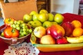 Choice, fresh Fruit in three beautiful bowls on a red tablecloth with white lace