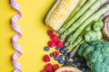 Choice of healthy food for heart, life concept on a color background with copy space top view. Foods including vegetables, fruits Royalty Free Stock Photo