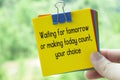 Choice about tomorrow text on sticky notes with bright nature background Royalty Free Stock Photo