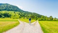 A choice of two ways. Woman at a crossroads Royalty Free Stock Photo