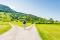 A choice of two ways. Woman at a crossroads Royalty Free Stock Photo