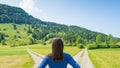 A choice of two ways. Woman at a crossroads Royalty Free Stock Photo