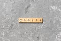 CHOICE word written on wood block. CHOICE text on cement table for your desing, concept Royalty Free Stock Photo