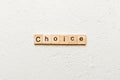 CHOICE word written on wood block. CHOICE text on cement table for your desing, concept Royalty Free Stock Photo