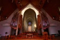 Choir, altar and organ with tuned pipes under sloped ceiling on interior of Holy Trinity Cathedral, Parnell, Auckland, New Zealand Royalty Free Stock Photo