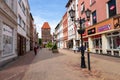 Chojnice, Pomorskie / Poland - May, 29, 2019: Old Gate in the city walls. Old brick buildings in a small city