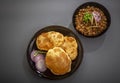 Chole bhature served in a plate