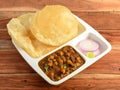 Chole Bhature, spicy Chick Peas curry also known as Chole or Channa Masala is traditional North Indian main course recipe and
