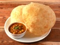 Chole Bhature, spicy Chick Peas curry also known as Chole or Channa Masala is traditional North Indian main course recipe and Royalty Free Stock Photo