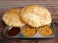 Chole Bhature, spicy Chick Peas curry also known as Chole or Channa Masala is traditional North Indian main course recipe and